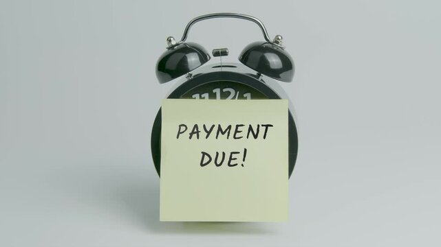 Payment Due Text or Word on Yellow Note Paper Sticking onto Black Alarm Clock on White Background With Sound