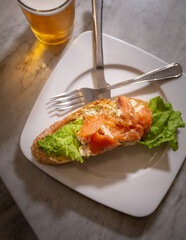 A Pincho with Beer ready to eat, top view. The Pincho is a typical snack from Spain.