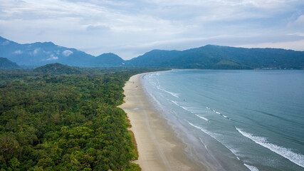 Beautiful aerial view of a preserved area, Fazenda Beach, within the Serra do Mar State Park, a destination for sustainable and ecological tourism in Atlantic Rainforest, between Montains and Sea.