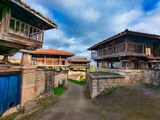 Obraz premium Paneras and horreos, typical buildings in Asturias, Baselgas village, Grado municipality, Asturias, Spain