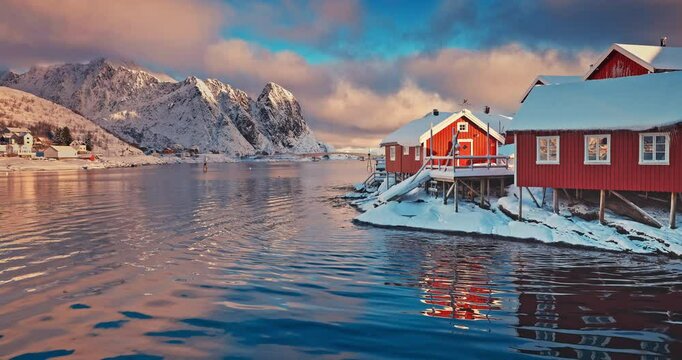Lofoten Islands,Norway, Hamnoy fishing village with red rorbuer houses in winter nature panorama landscape