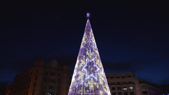 Christmas lights on the tree in Plaza El&iacute;ptica, in the center of the streets of the city of Bilbao. Province of Bizkaia. Basque Country. Spain. Europe