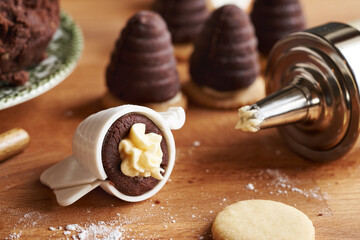 Fillling beehives or wasp nests, traditional Czech Christmas cookies, with sweet cream