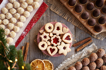 Linzer pastry, Czech wasp nests and other traditional Christmas cookies on a table