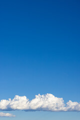 Peaceful Blue Sky with Fluffy Clouds © VaCity