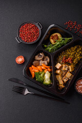 Quinoa bowl with tofu, steamed vegetables, grains, seeds and spices