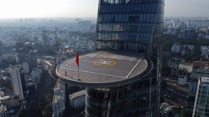 Aerial view of the futuristic skyscraper and his helipad inspired by a Lotus flower design in Ho Chi Minh City, Vietnam. © Nelson Antoine