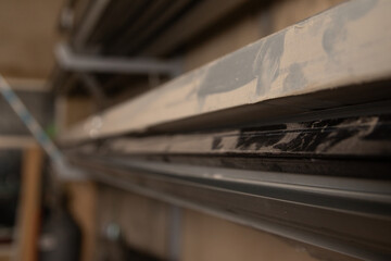 Close-Up of Dusty Metal Pieces with Blurred Background