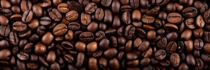 Obraz premium Hot and Rich Coffee Beans Background. Perfect Texture and Roasted Bean for your Cafe and Caffeine Needs