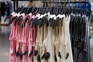 Colorful assortment of tanks displayed in a stylish retail store