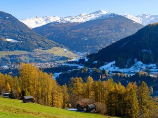 View towards Wipptal (valley Wipp) and the Brenner motorway. Autumn at the Telfer Wiesen in the...