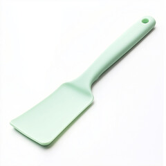 Fototapeta premium Ergonomic pastel green silicone spatula with a soft, durable blade, designed for delicate cooking and baking tasks