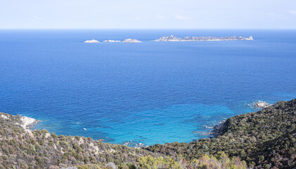 Aerial view of the small beaches on the coast of Castiadas in Sardinia with transparent, blue and turquoise water