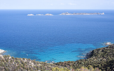 Aerial view of the small beaches on the coast of Castiadas in Sardinia with transparent, blue and turquoise water