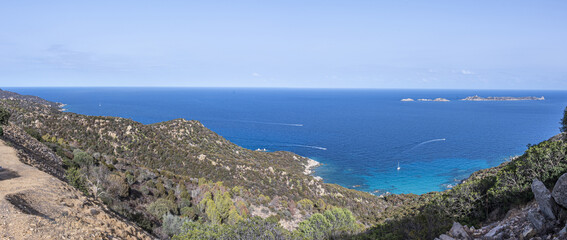 Aerial view of the small beaches on the coast of Castiadas in Sardinia with transparent, blue and turquoise water