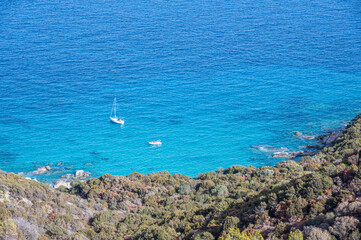 Aerial view of the small beaches on the coast of Castiadas in Sardinia with transparent, blue and turquoise water