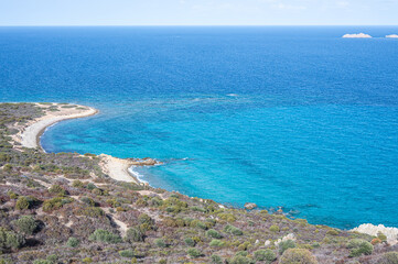 Aerial view of the small beaches on the coast of Castiadas in Sardinia with transparent, blue and turquoise water