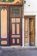 L'Isle-sur-la-Sorgue, Avignon, Vaucluse, Provence-Alpes-Cote d'Azur, France. Colorfully painted old wooden door.