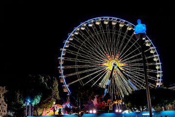 Colorful illuminated ferris wheel, Nice, Cote d'Azur, France