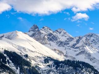 View from Hochleite towards Mt. Trettachspitze and Mt. Madelegabel. The Allgau Alps near Oberstdorf during winter in Bavaria, Germany.