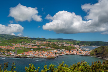 The City of Horta and Horta Bay Faial island of the Azores, Portugal. Aerial view of Portuguese town Horta on an the Atlantic ocean coast, on a sunny day, Faial island.
