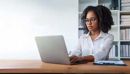 Young woman online shoping with credit card on laptop. Female freelancer connecting to internet via computer. 