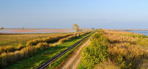 The narrow-gauge railway. Landscape at the Hortobagy Great Fishponds (Hortobagy-Halasto) in the...