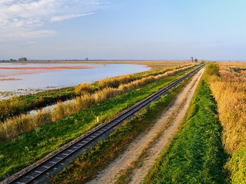 The narrow-gauge railway. Landscape at the Hortobagy Great Fishponds (Hortobagy-Halasto) in the National Park Hortobagy, listed as UNESCO World Heritage Site and Ramsar site. Eastern Europe, Hungary.