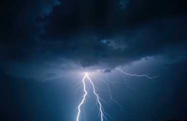 Dramatic lightning bolt strikes dark stormy sky. Powerful electric charge illuminates dense clouds. Nature raw energy flashes across dramatic weather scene. Stormy night sky displays awesome force.