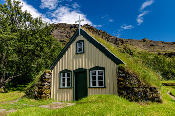 Obraz premium Historic Hofskirkja Church and cemetery in Oraefi, Iceland