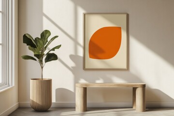 Orange and beige poster in a wooden frame on the wall.