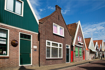 Holland, Netherlands, Volendam. Traditional buildings at the fishing village of Volendam in Holland.