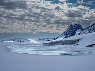 Svalbard, Norway. Landscape of mountain, glacier and water.