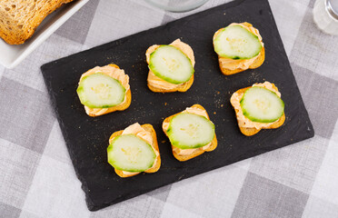 Light and tasty snack before lunch - sandwiches with cucumber and pate