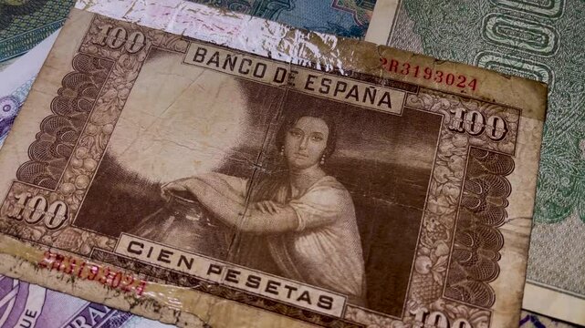 reverse view of an old Spanish 100 pesetas banknote from 1953. old money collection.