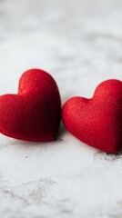 Fototapeta premium Two Red Heart Shaped Cushions on Soft White Surface Symbolizing Love and Togetherness : Generative AI