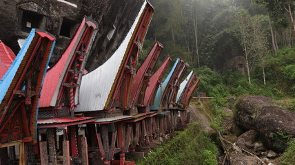 Coffins and graves are placed inside rocks. This is a tradition used as a burial place for the...