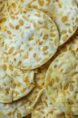 close up view of keripik tempe or tempeh chips are made from soybeans 