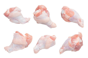 Set of raw chicken drumsticks isolated on a white background