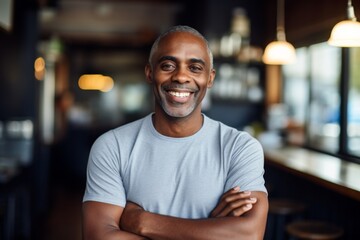 Obraz premium Smiling portrait of a middle aged male African American small business owner