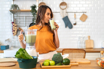 Portrait of beauty healthy asian woman making green vegetables detox cleanse and green fruit...