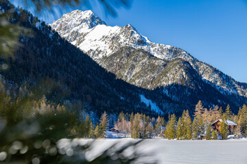 Champex-Lac on a snowy winter day in Orsieres in the district of Entremont in the canton of Valais in Switzerland