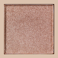 Fototapeta premium Closeup view pink with golden shimmer eyeshadow, warm, metallic shade with glitters, sun shadow, detail texture, Glitter Swatch makeup powder eyeshadow, highlighter, cosmetic beauty product