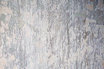 Exterior stucco on an old house is damaged. Exterior finish.