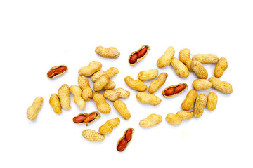 Roasted peanuts in shell on white background.