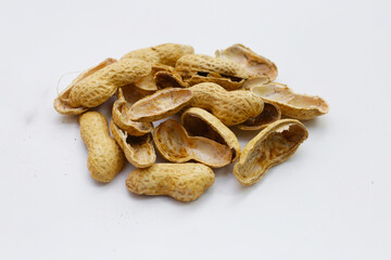 Peanut shells on white background.