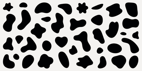 Fototapeta premium Abstract black shapes on a white background. Random, irregular forms create a pattern. Abstract shapes, black and white, irregular forms, pattern. Black shape vector set.