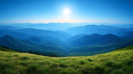 Fototapeta premium A beautiful sunset over a mountain range with a field of tall grass. The sky is a mix of orange and blue hues, creating a serene and peaceful atmosphere. The sun is setting behind the mountains