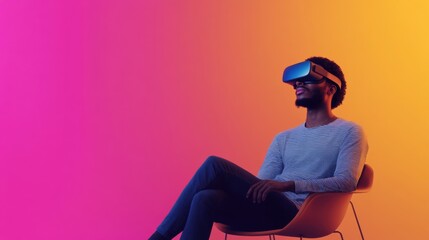 Young man experiencing virtual reality with VR headset, exploring digital worlds while seated in modern chair against vibrant colorful background gradient