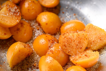 Cape gooseberry or Golden berry (Physalis peruviana) with chili powder and sugar, Spicy fruit salad